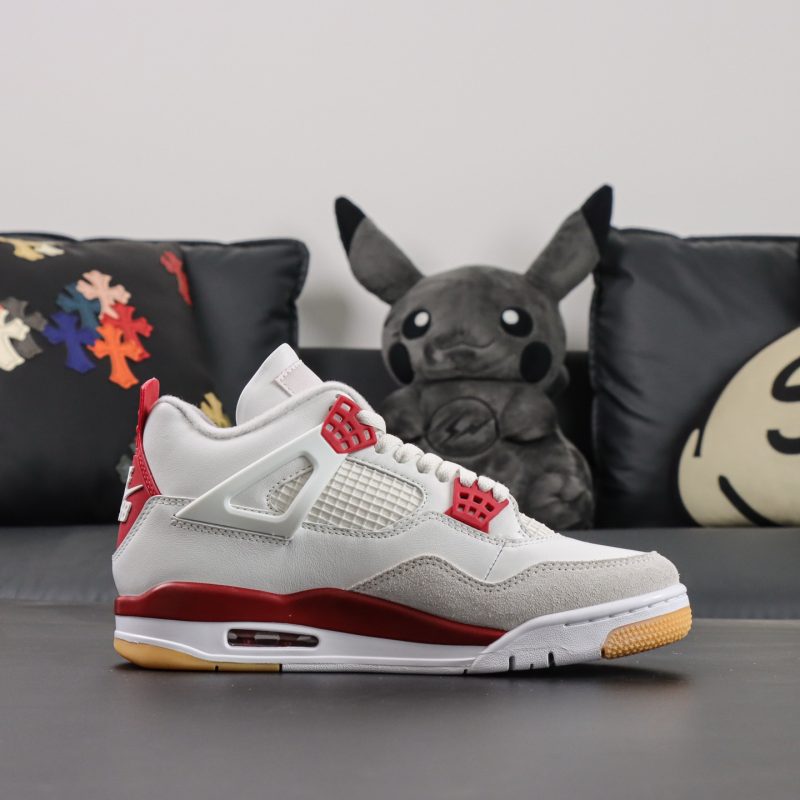 Side view of Nike SB Jordan 4 Varsity Red reps with gum outsole