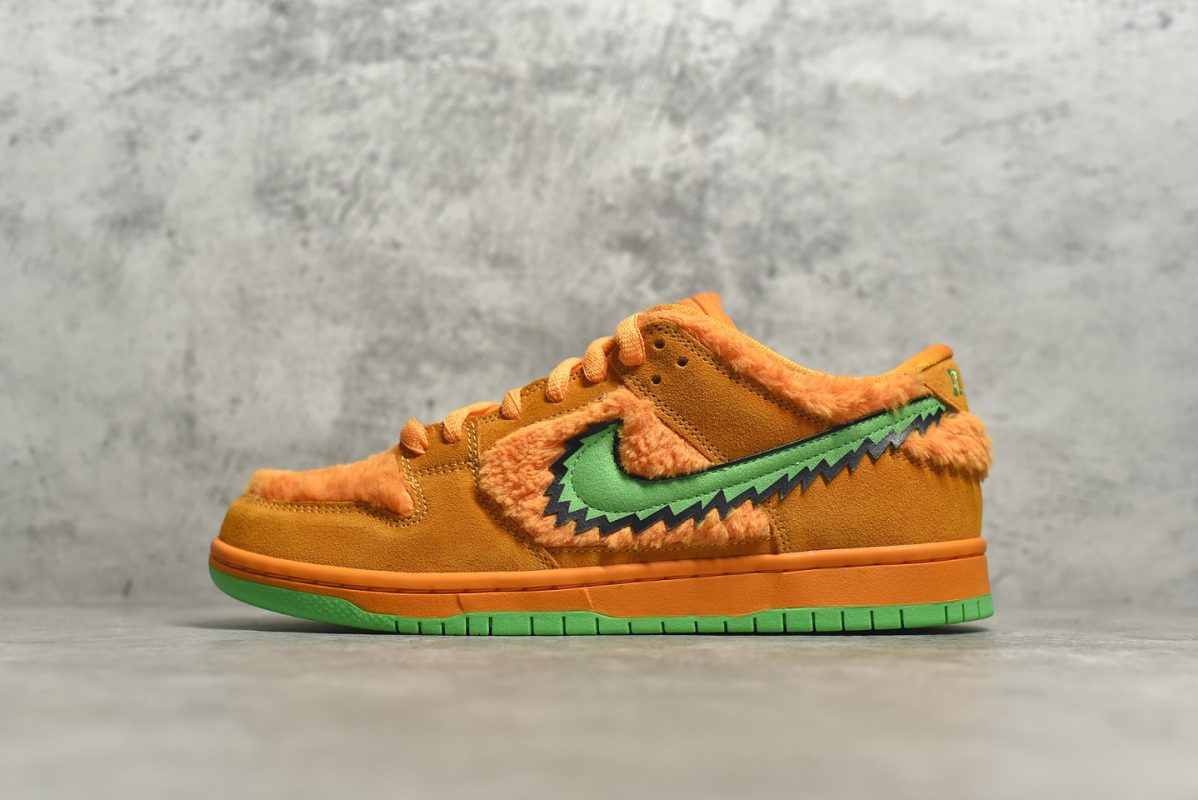outside view of Orange Bear SB Dunks with stash tongue pocket