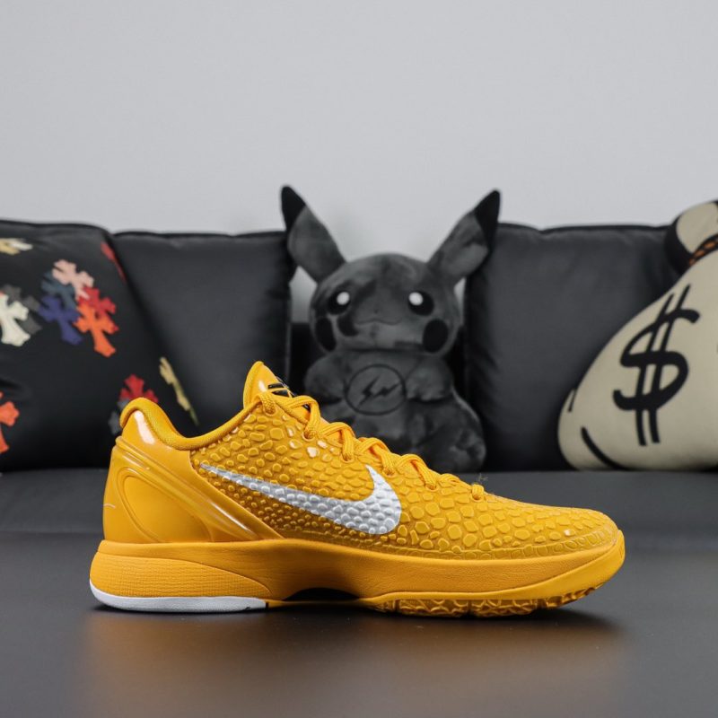 Inner view of Off-White Kobe 6 reps showing medial text and yellow mesh