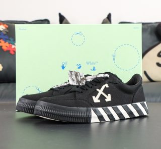 Side view of Off White Low Vulcanized Black White Reps