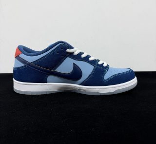 Medial side view of Why So Sad Dunk Reps with chicken logo detail