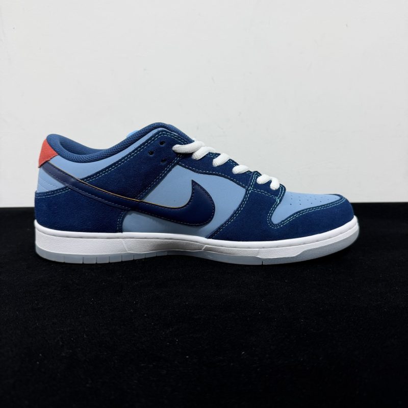 Medial side view of Why So Sad Dunk Reps with chicken logo detail