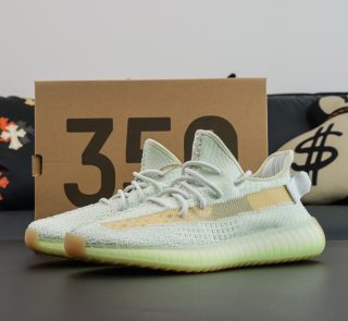 Yeezy 350 Flax reps with yellow-tinted upper and original box