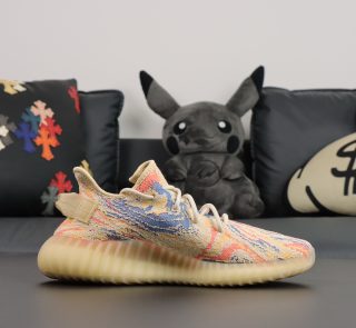 Inside view of MX Oat Yeezy 350 reps with translucent stripe and yellow tones