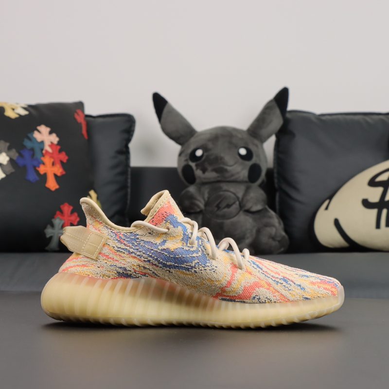 Inside view of MX Oat Yeezy 350 reps with translucent stripe and yellow tones