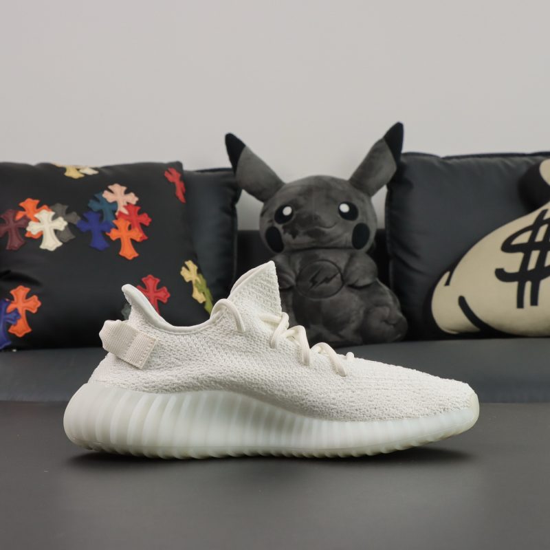 Inside view of Yeezy 350 Triple White reps showing ribbed texture