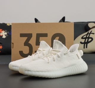 Yeezy 350 Triple White reps with box and full white silhouette