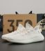 Yeezy 350 Triple White reps with box and full white silhouette