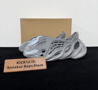 Yeezy Foam Runner Granite Reps with box displayed on table