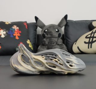 Single side profile of Yeezy Foam Runner Moon Gray with foam cutouts