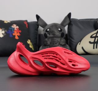 Single side view of Vermilion Yeezy Foam Runner in vivid red