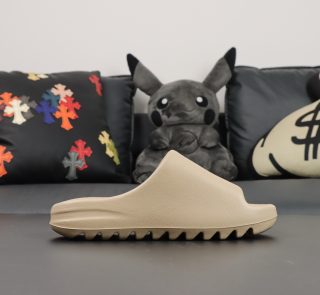 Outside angle of Yeezy Slide Pure EVA slide
