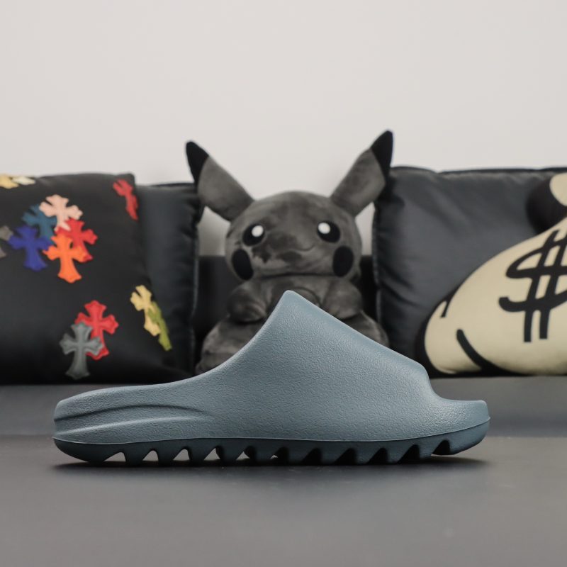 Outside view of Slate Marine Yeezy Slide replica with curved strap
